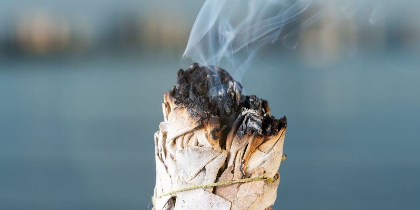 Health-innovations Smudging Ritual using burning thick leafy bundle of White Sage