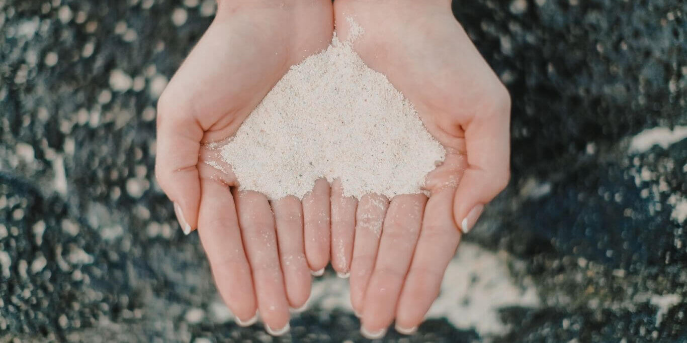 Holding a handful of silica