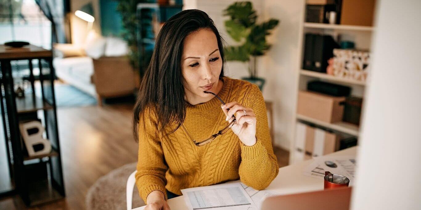 young woman working at a laptop